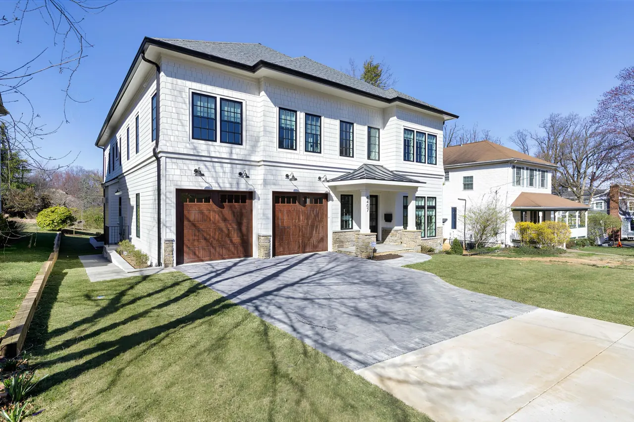 Beautiful home with garage door installed by First Choice